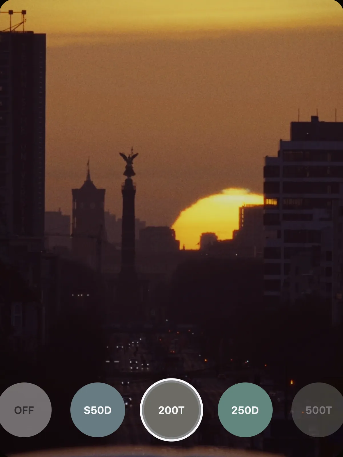 The same sunset through 200T: softer contrast and violet shadows
