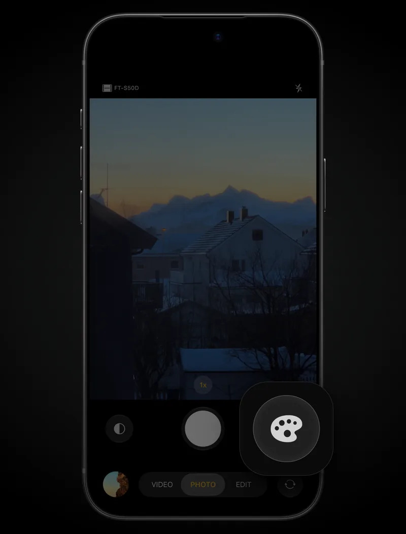 The camera with the palette button raised, right of the shutter